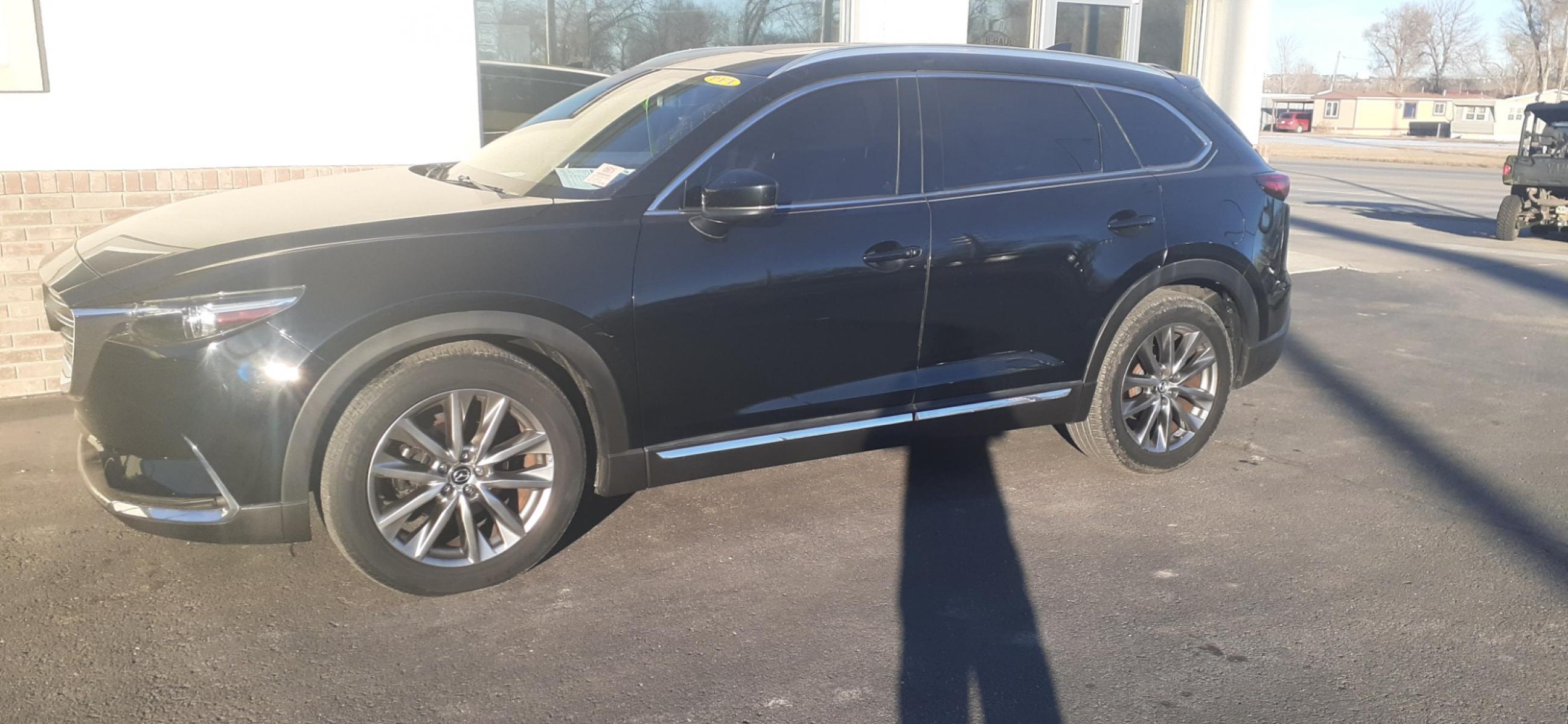 2016 Mazda CX-9 Signature AWD (JM3TCBEY0G0) with an 2.5L L4 DOHC 16V engine, 6A transmission, located at 2015 Cambell Street, Rapid City, SD, 57701, (605) 342-8326, 44.066433, -103.191772 - Carfax available - Photo #1
